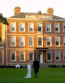 Couple infront of house