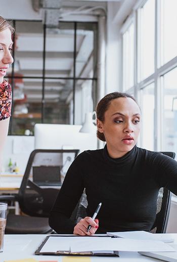 Two Ladies working 497331935